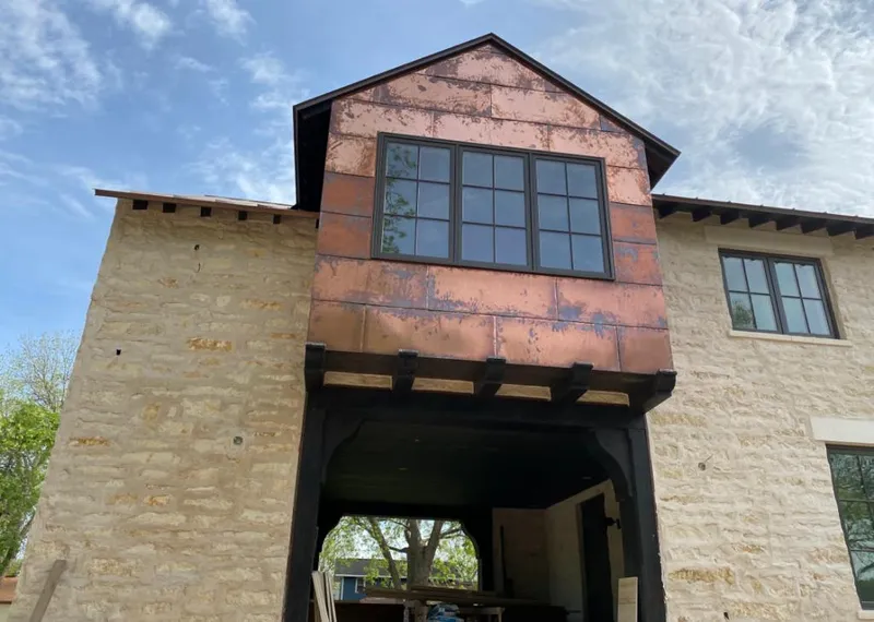 Copper metal panel facade on a stone building for Skylight Installation in La Crescenta-Montrose
