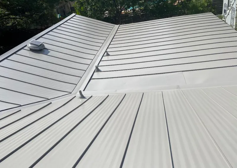 Solar attic fan installed on a metal roof for Roof Ventilation in La Crescenta-Montrose